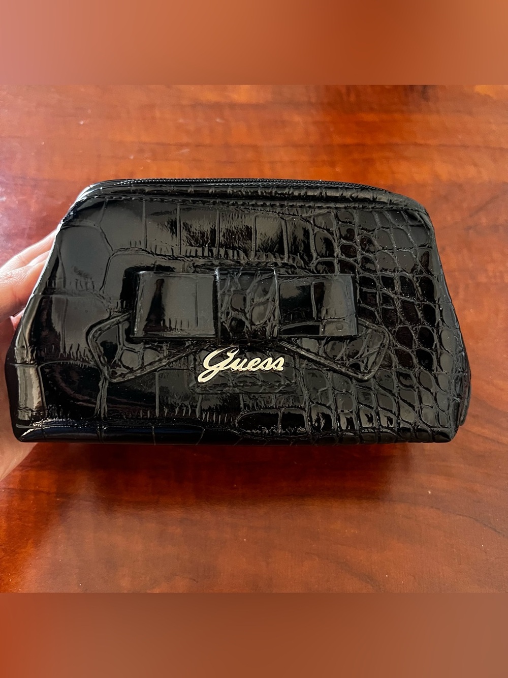 GUESS Black Croc-Embossed Patent Zip Pouch with Bow Detail